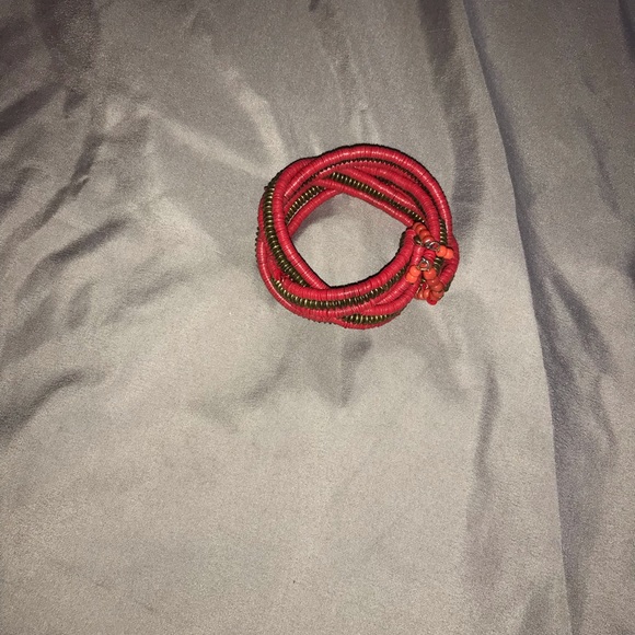 Red and gold beaded bracelet made in Nigeria. - Picture 2 of 3